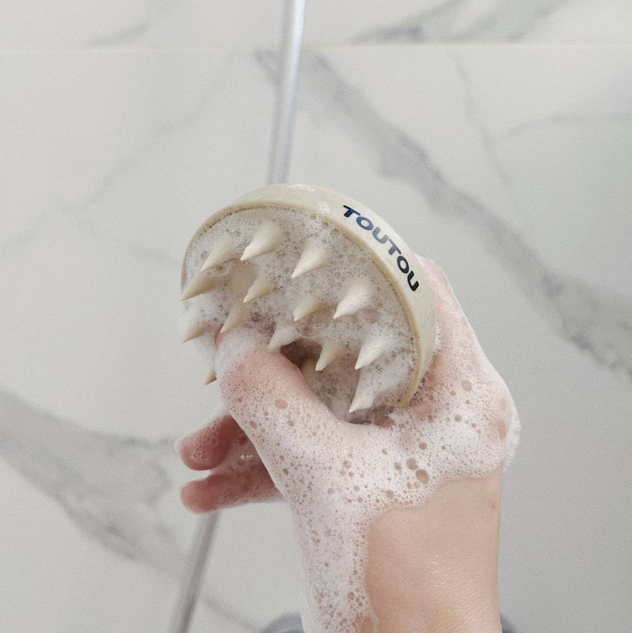 Brosse pour la douche en silicone ￼